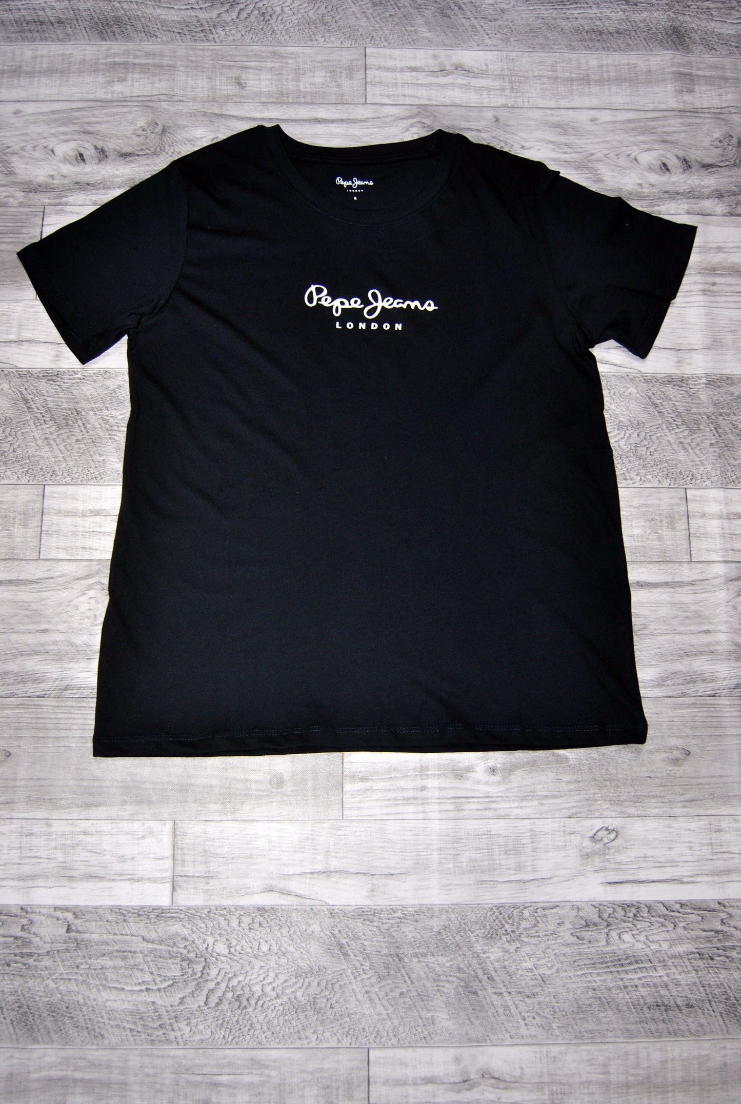 Camiseta Pepe Jeans de color negro con estampado. Talla L.