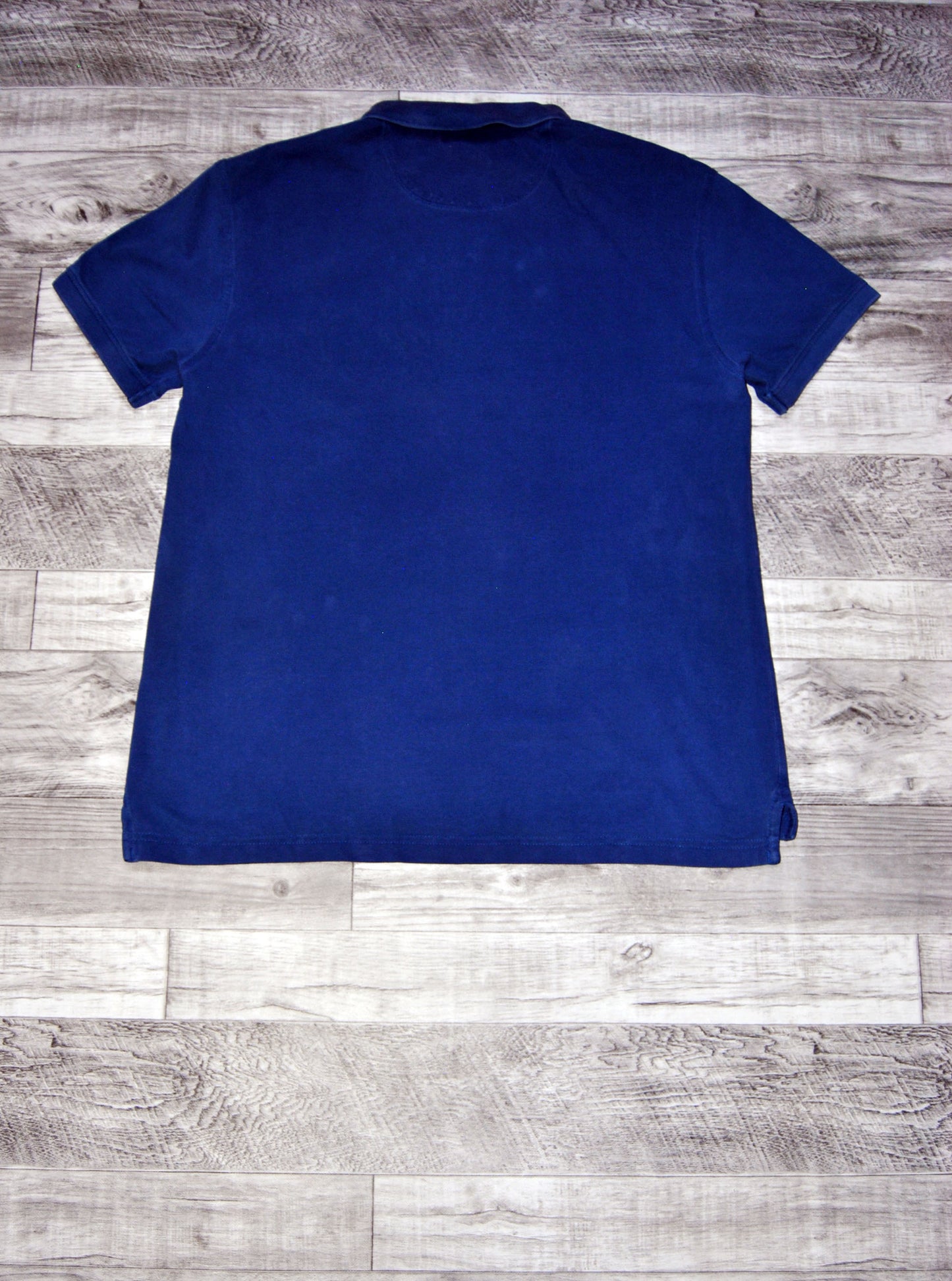 Polo Levis de color azul. Talla L. Segunda Mano