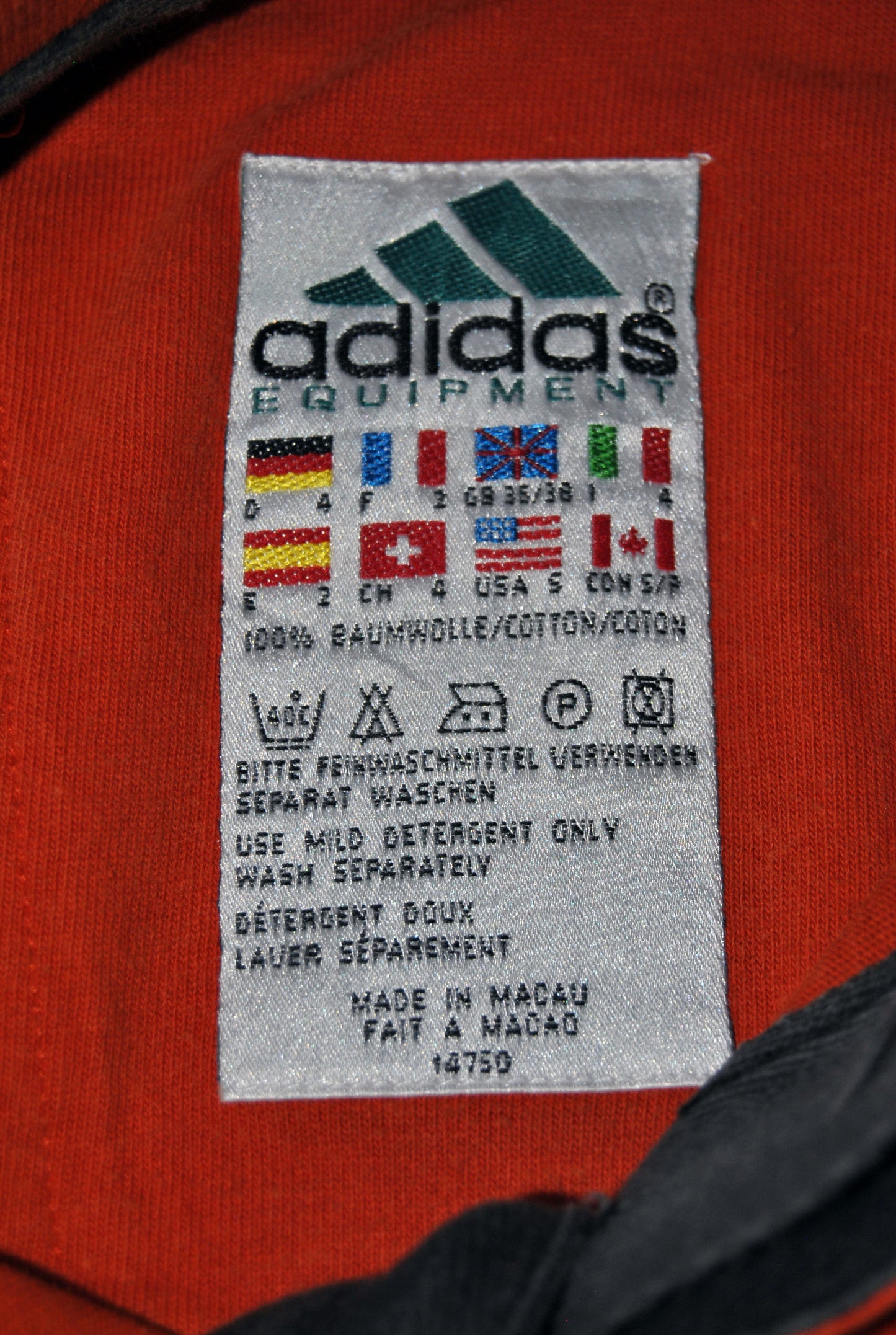 Polo Adidas de color naranja. Talla M. Segunda Mano