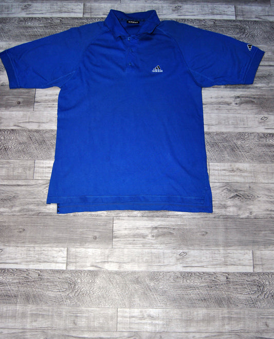 Polo Adidas de color azul. Talla XXL. Segunda mano