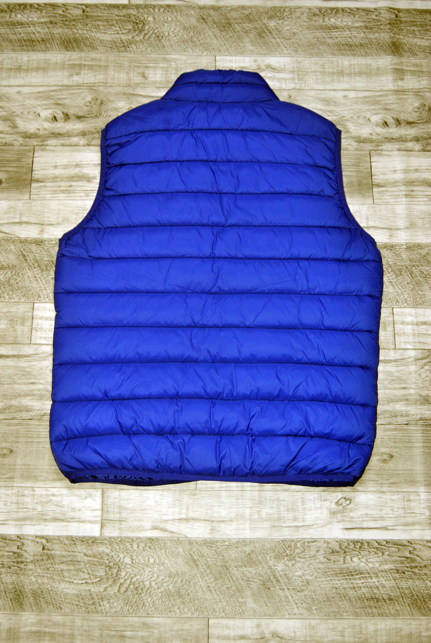 Chaleco Norway color azul eléctrico con 2 bolsillos. Talla M.